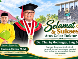 Asisten I Setda Gorontalo Utara Dr. Irwan A. Usman, M.Pd Sampaikan Ucapan Selamat kepada Bupati Thariq Modanggu atas Gelar Doktor